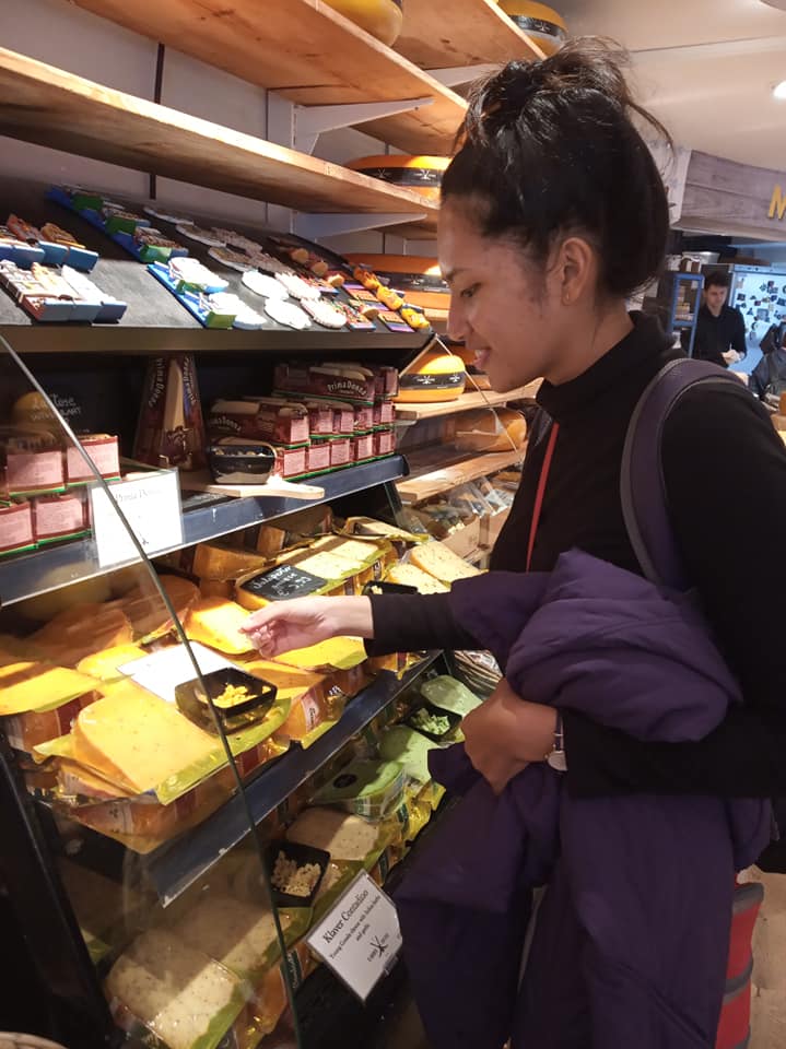 Choosing cheese in Amsterdam cheese museum