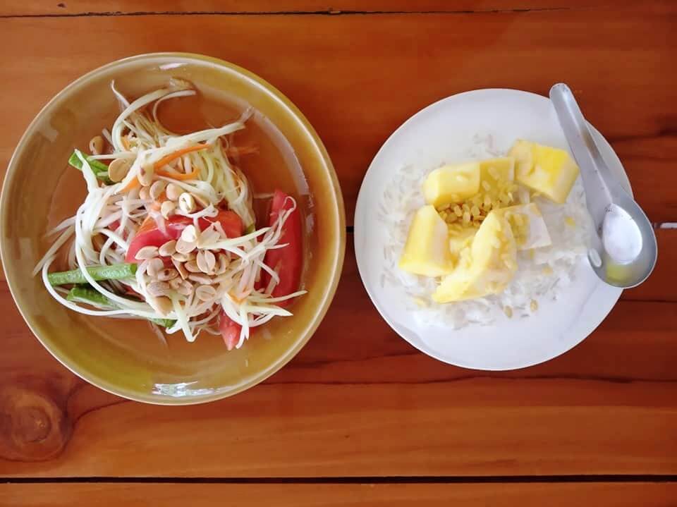 Papaya salad and mango with sticky rice.