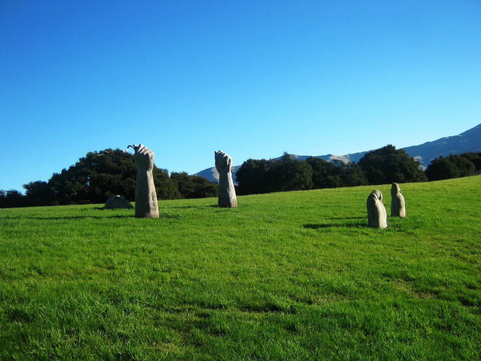 Akaroa sculpture of man in ground